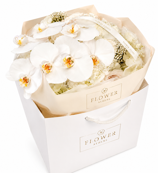 White Orchids in a Premium Flowers Athens Bag